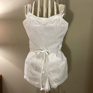 Guess 2 adorable white eyelet romper. Lined. Perfect for spring and summer.